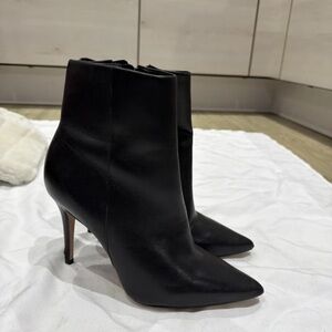 Sleek Black Leather Heeled Boots